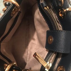 MK small satchel with short and long strap .